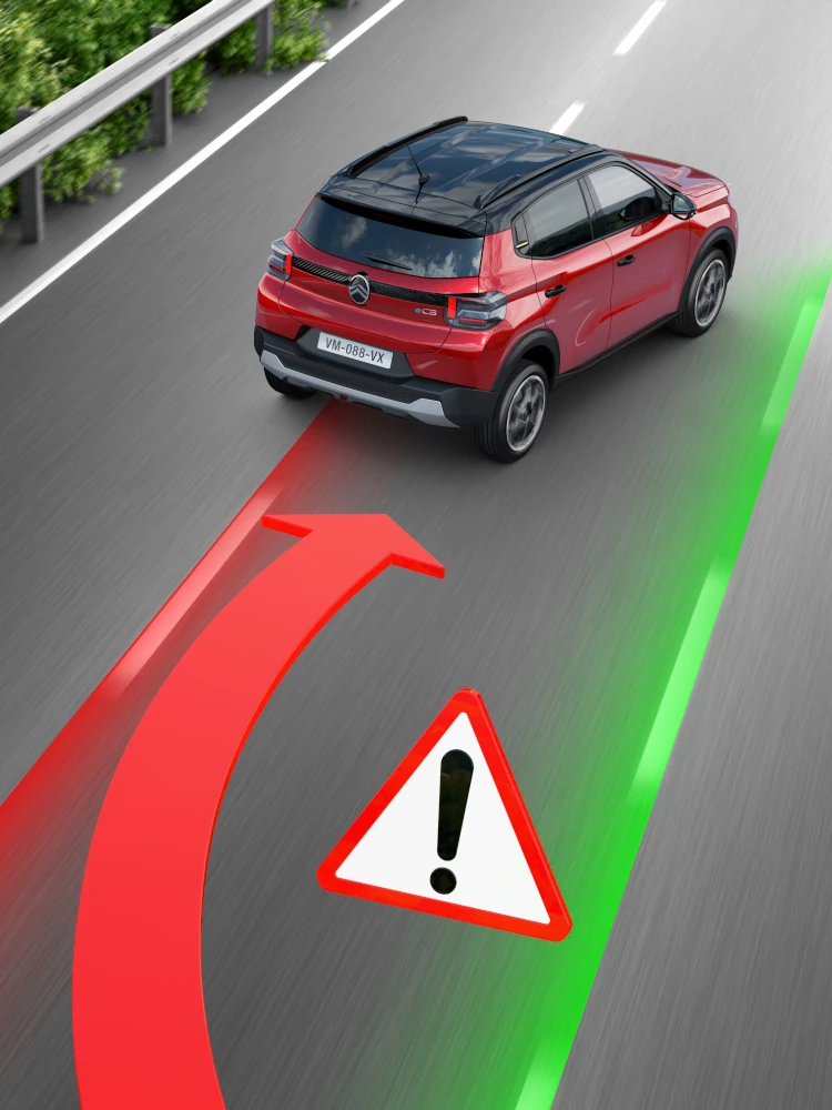 Vue arrière de Citroën ë-C3 en conduite, l'aide au maintien de voie pour une mobilité plus sûre.